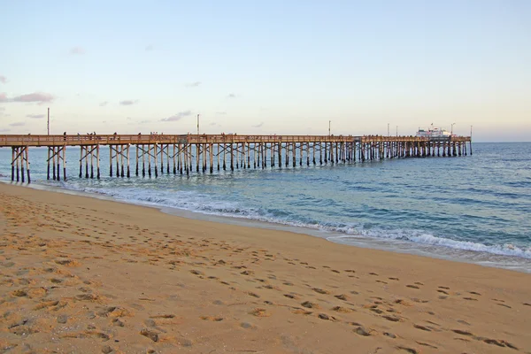 Beach pier at California coast — Stock Photo, Image