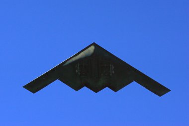 Airplane B-2 Stealth Bomber flying over 2016 Rose Parade New Years Day in Pasadena, California clipart