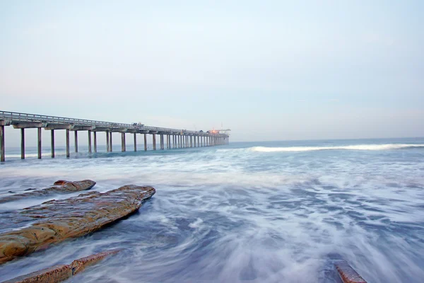 Beach pier sunrise during winter foggy morning at La Jolla, San Diego, California — Stock Photo, Image