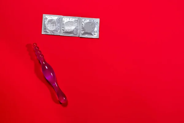 Sex Toy Adults Anal Dildo Condoms Red Background Place Text — Stok fotoğraf