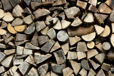 Texture of Firewood Prepared for Stove Heating, Natural Abstract Brown Background.