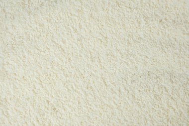 Beyaz kurutulmuş hindistan cevizi arkaplan dokusu üst görünümü.