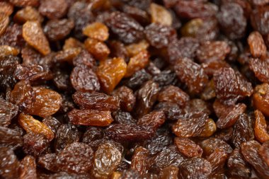 Kahverengi üzümlerin makro dokusu, yemek arkaplanı.