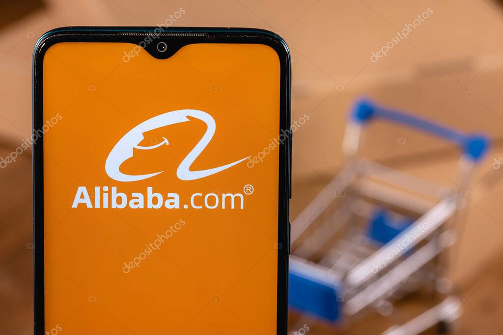 Alibaba logo on the screen smartphone. Alibaba Group Holding Limited is a Chinese multinational technology company specializing in e-commerce, retail, Internet.