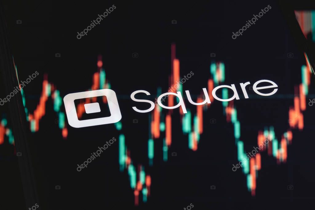 Kazan, Russia - May 30, 2021: Square is technology company that develops solutions for accepting and processing electronic payments. Square logo on smartphone screen. Stock chart in the reflection.