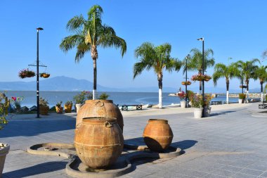 View of the Malecon de Chapala with a fountain shaped like barrels, Jalisco clipart