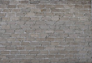 Empty Background wall with gray bricks, exterior view