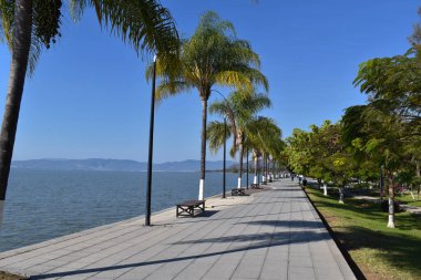 Photo of the Ajijic boardwalk, with Lake Chapala in the background  clipart