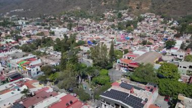 Drone forward moving shot flying above the main square and downtown area of Ajijic Jalisco Mexico