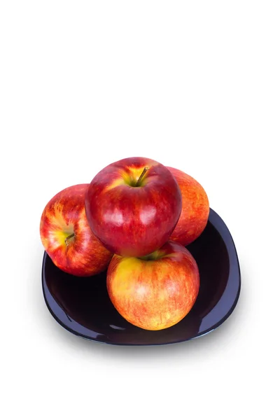 Red apples on a plate — Stock Photo, Image