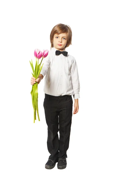 Jongen met tulpen — Stockfoto