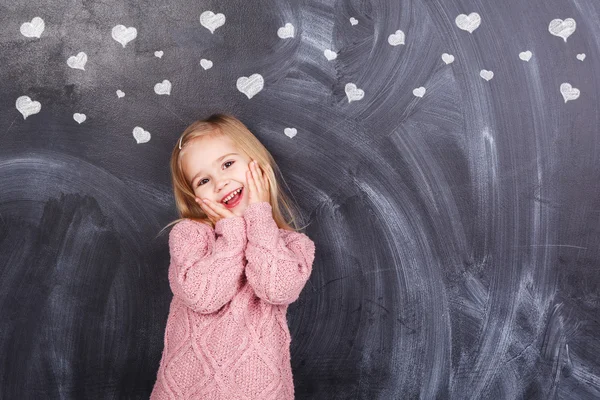 Girl and hearts — Stock Photo, Image
