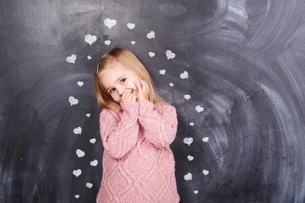 Girl and many hearts — Stock Photo, Image