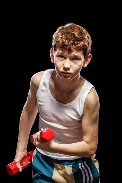 Boy shakes his muscles — Stock Photo, Image