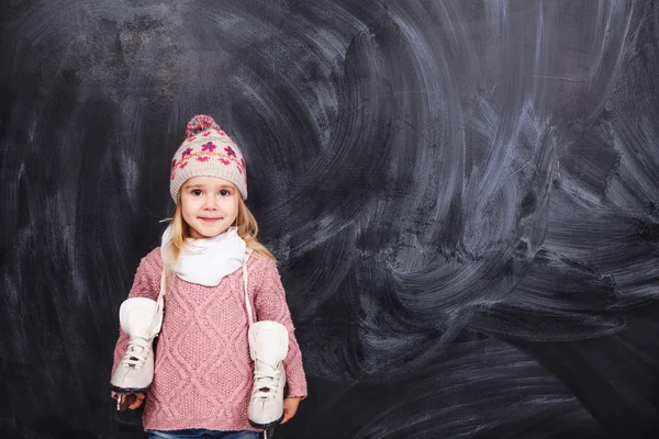 Baby with skates — Stock Photo, Image