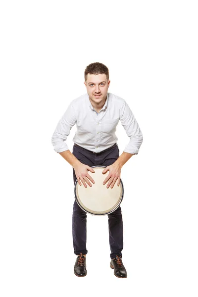 Man playing the djembe standing — Stock Photo, Image