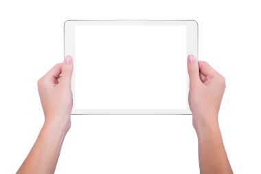 In the hands of girl white tablet