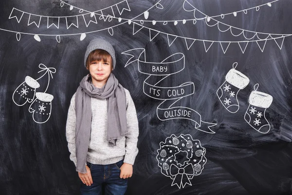 Little boy around the black chalkboards — Stock Photo, Image