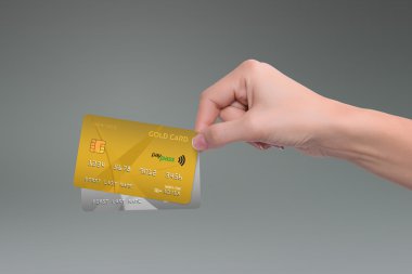 Altın ve gri kredi kartları gri izole