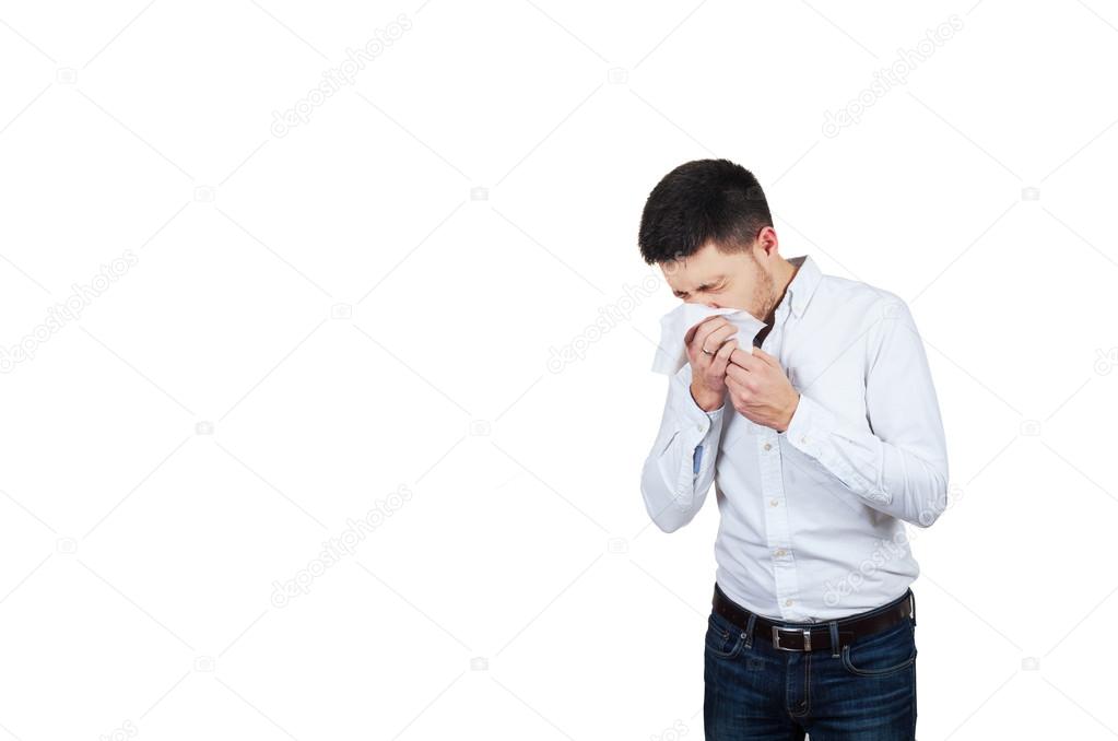 Man blows his nose