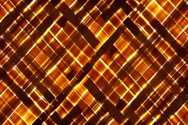 Sepet bambu dokusunun dokusu ılık bir ışıkla örülmüş. saman arkaplanı