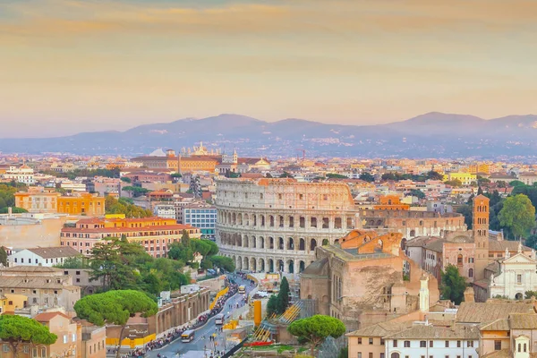 Top view of  Rome city skyline with Colosseum and Roman Forum in Italy.