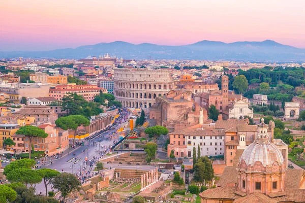 Top view of  Rome city skyline with Colosseum and Roman Forum in Italy.