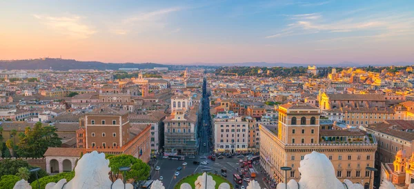 View of old town Rome skyline in Italy at sunset