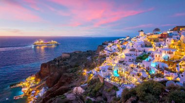 Great twilight view of Santorini island. Sunset on the famous Oia city, Greece, Europe clipart