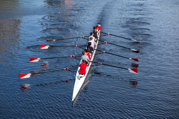 A Harvard's Crimson Lightweight Crew practicing for a race in th