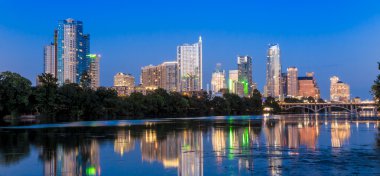 Beautiful Austin skyline reflection at twilight clipart