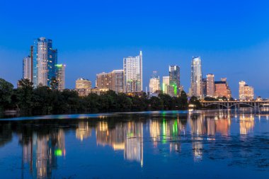 Beautiful Austin skyline reflection at twilight clipart