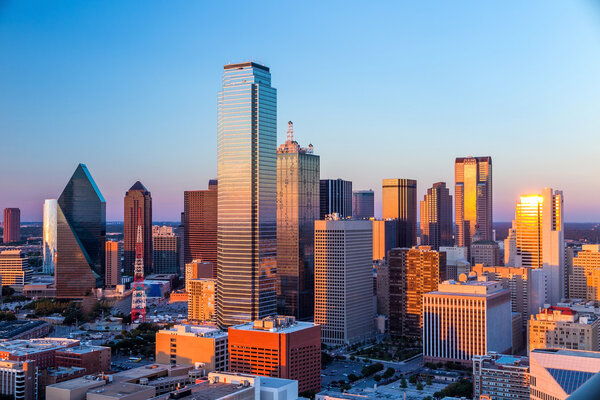 Dallas, Texas cityscape with blue sky at sunset