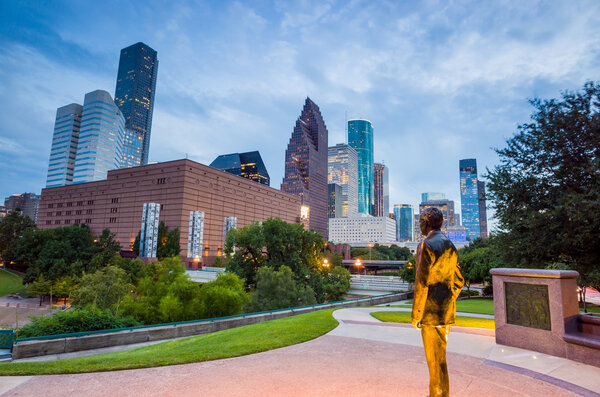 View of downtown Houston at twilight with skyscraper