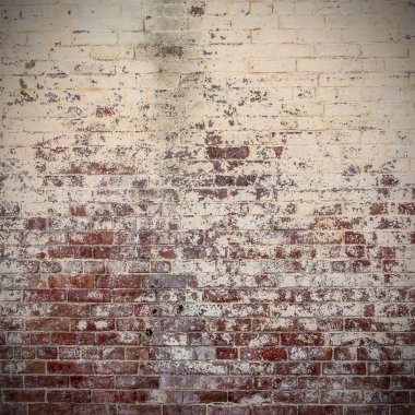 Eski tuğla duvar bir arka planda 