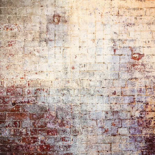 Eski tuğla duvar bir arka planda — Stok fotoğraf
