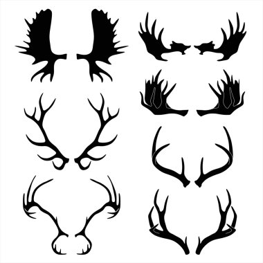 Silhouettes of deer and moose horns. clipart