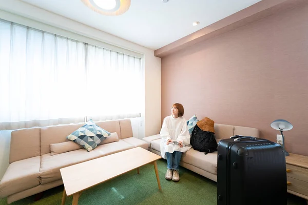 Asian Woman Relaxing Simple Hotel Room — Stock Photo, Image