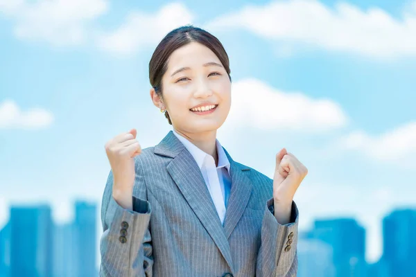 Asian Young Business Woman Doing Guts Pose — Stockfoto