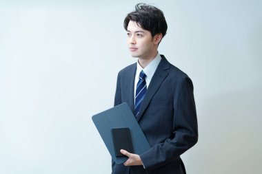 Asyalı genç iş adamının portresi