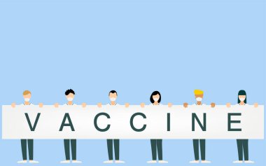 Sağlık uzmanlarının elinde VACCINE etiketli bir pano var.