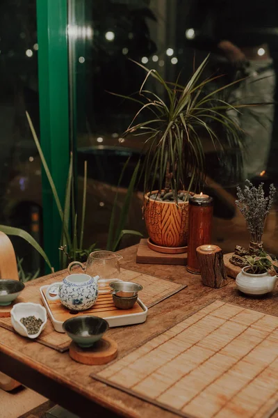 Woman serving Chinese tea in a tea ceremon