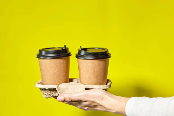 Hands Holding Two Cups Brown Paper Black Lid Two Coffee — Stock Photo, Image