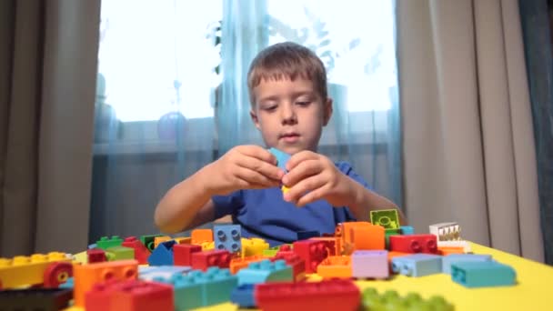 Beautiful Boy Playing Home Building Blocks Cute Smiling Boy Playing — Stock Video