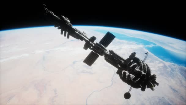 Gran nave espacial en la órbita de la Tierra. elementos proporcionados por nasa — Vídeo de stock
