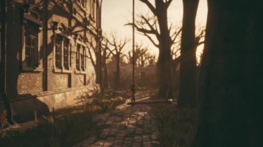 Gün batımında terk edilmiş eski ev