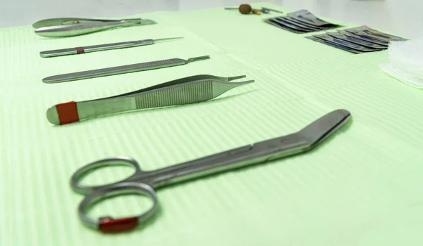 Close Podiatry Material Work Table Can See Scissors Tweezers Foreground — Stock Photo, Image
