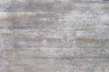 Güçlendirilmiş beton duvarın kahverengi ve gri dokusunun ayrıntıları