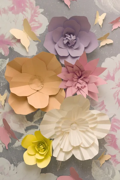 Vintage paper flowers. Pink, Blue, yellow and White flowers paper background pattern lovely style. Rose made from paper.