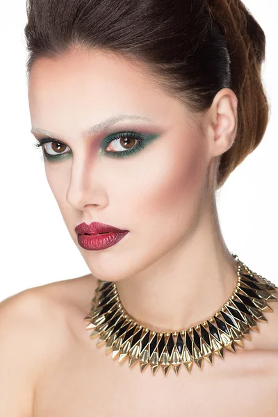 Glamour portrait of beautiful woman model with creativ makeup and original hairstyle. Fashion shiny highlighter on skin, sexy red lips make-up and dark eyebrows — Stock Photo, Image